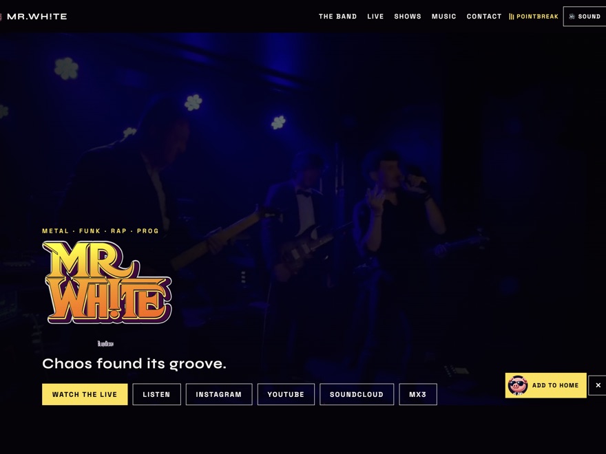 Mr.Wh!te home: the wordmark over a live stage photograph, under the headline “Chaos found its groove.”